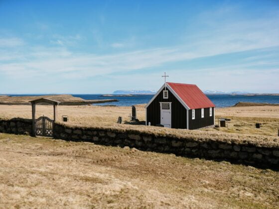 lonesome wooden church on desolated river coast
