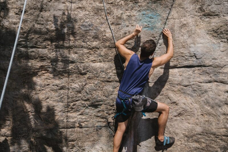 a person doing rock climbing