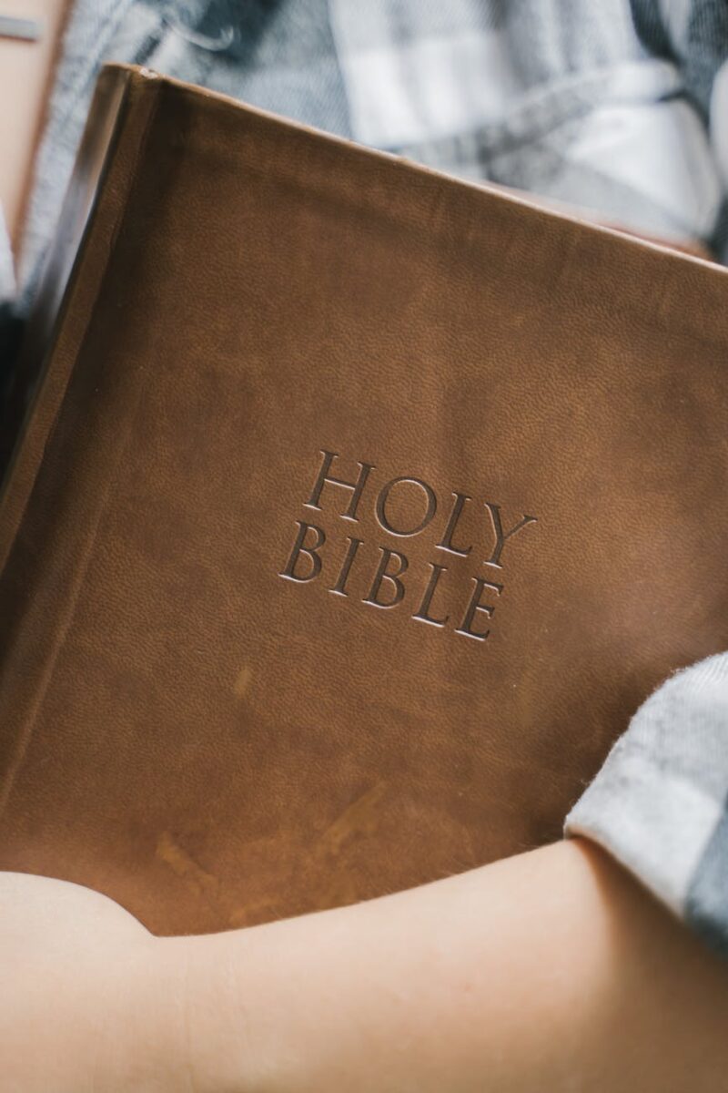 a person holding a bible