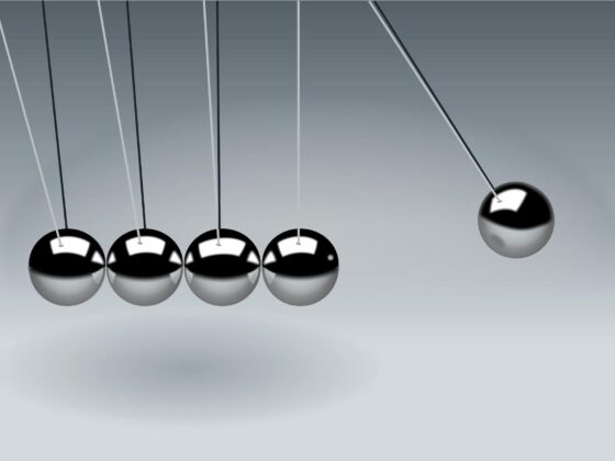 gray newton s cradle in close up photogaphy