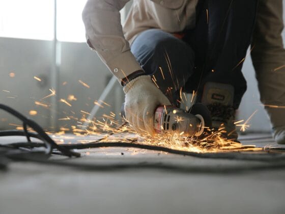 person holding grinder