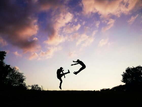Photo of a boot kick in a fight on a hill