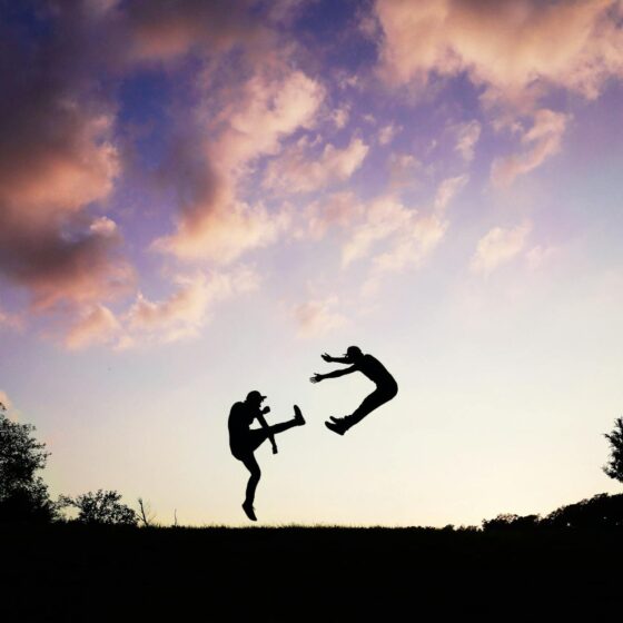 Photo of a boot kick in a fight on a hill
