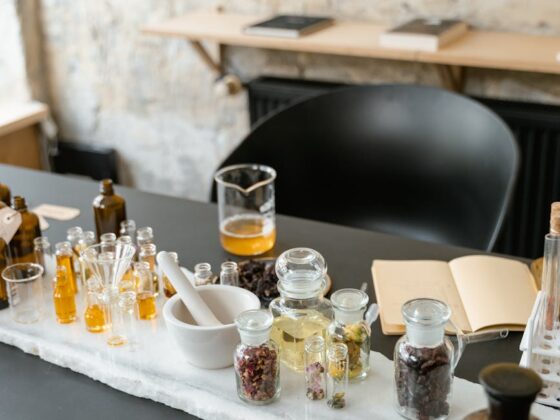 clear glass bottles on white table