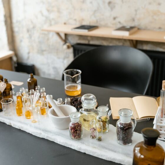 clear glass bottles on white table