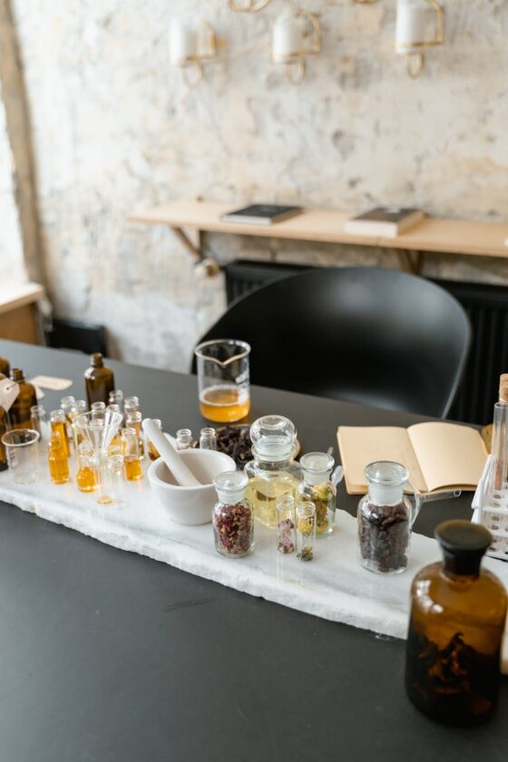 clear glass bottles on white table