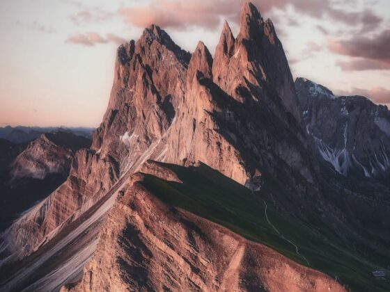 mountain range under beige sky