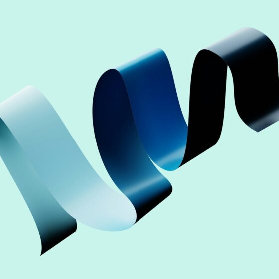 A ribbon with gradient colors floats in the air