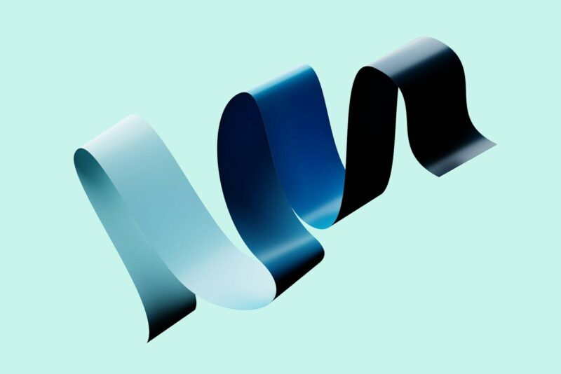 A ribbon with gradient colors floats in the air